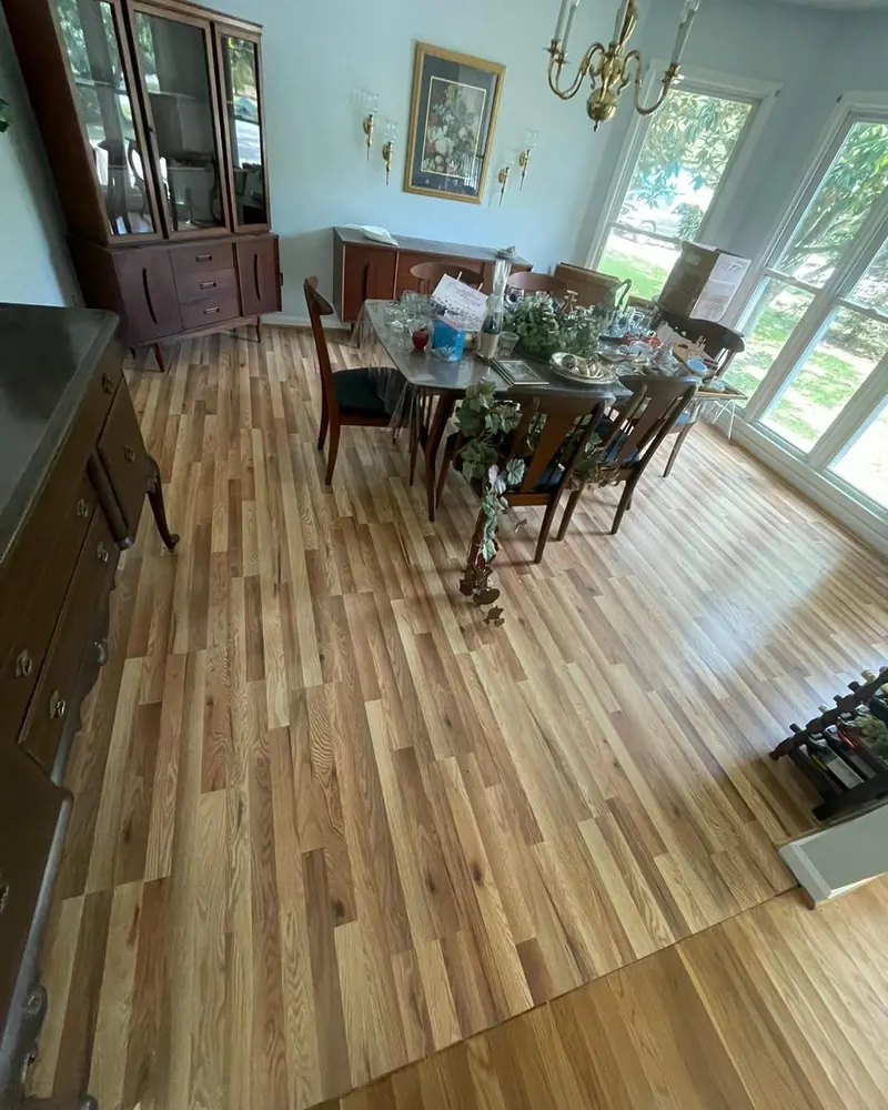 Wood-look porcelain plank in a finished dining room