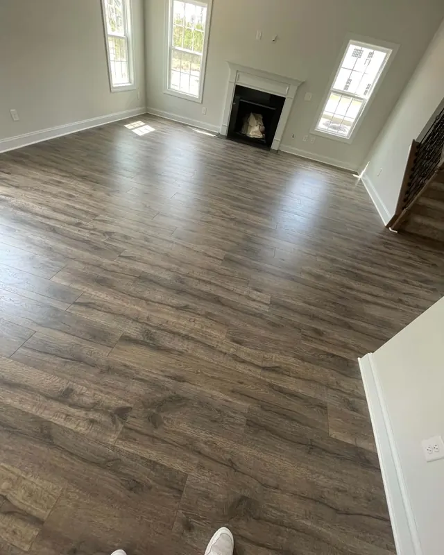 Wood-look porcelain plank through a living room